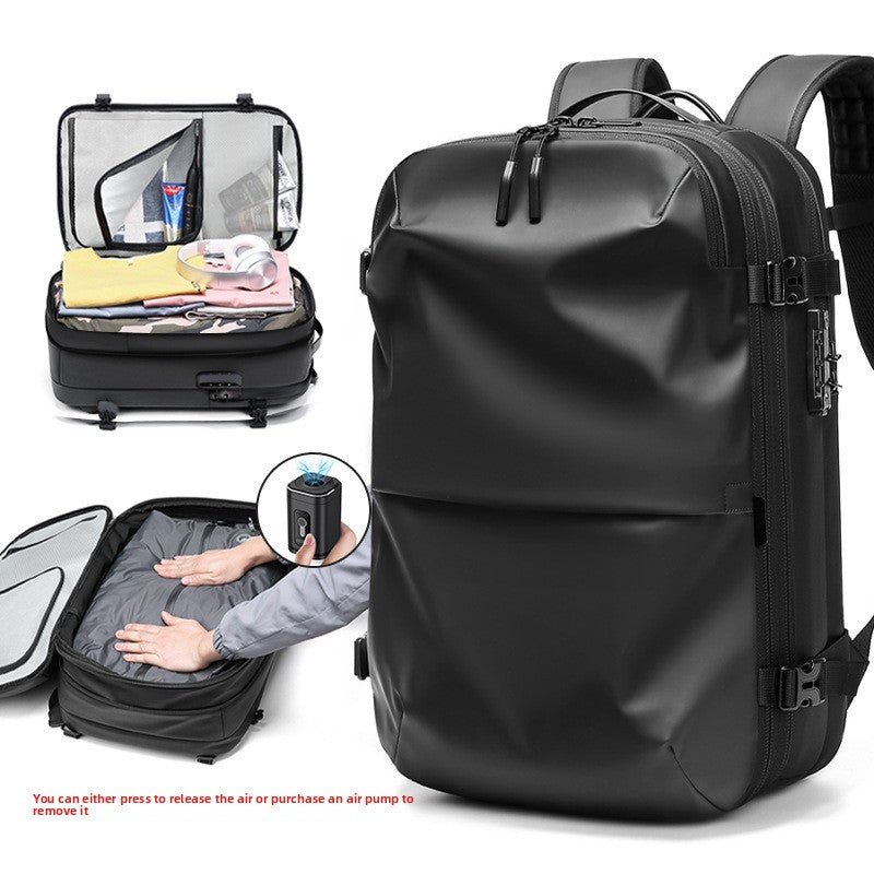 Black expandable vacuum compression travel backpack with packed compartments and electric air pump